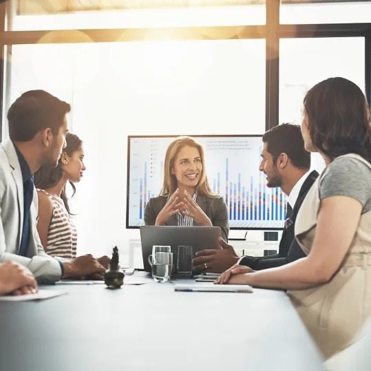A team discussing why to choose ERP Peers for NetSuite consulting